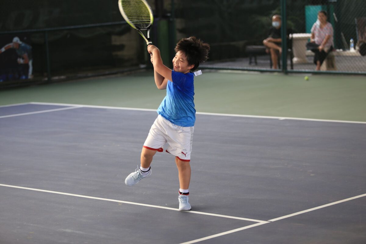 âge débuter tennis itf place technique